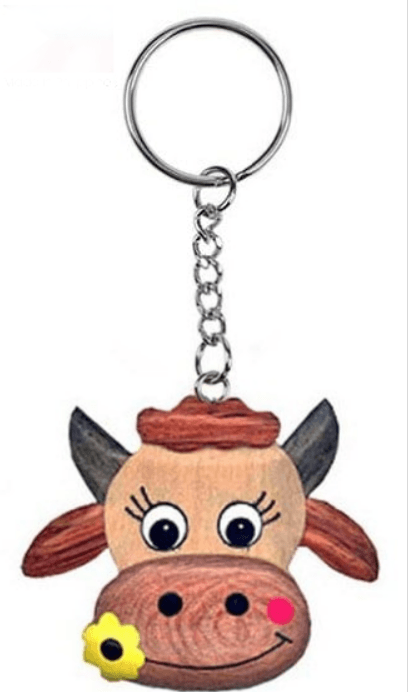 Porte clef  vache avec une fleur